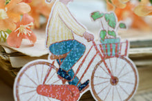 Lade das Bild in den Galerie-Viewer, Vinyl Sticker mit Holographischem Effekt - Frau auf Fahrrad - BIPoC - Hollandrad - Pflanzen