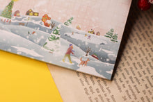 Lade das Bild in den Galerie-Viewer, Notizblock - Winterdorf - - Weihnachtliches Dorf - Schneebedeckte Landschaft - Briefpapier - DIN A5 - 50 Seiten - kariert - Wichteln