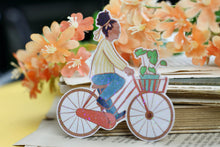 Lade das Bild in den Galerie-Viewer, Vinyl Sticker mit Holographischem Effekt - Frau auf Fahrrad - BIPoC - Hollandrad - Pflanzen
