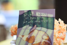 Lade das Bild in den Galerie-Viewer, B-Ware: Postkarte - Perlmutt Effekt - Katze mit Buch - you also need a cat - Handgemalte Illustration - Geburtstagskarte
