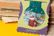 Lade das Bild in den Galerie-Viewer, Magnetisches Lesezeichen - Weihnachtsmann mit Rentier - Adventskalender - Verträumte Kunst, Glitzer - Geschenkidee - Eigene Illustrationen
