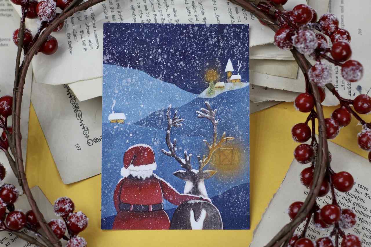 Postkarte - Weihnachtsmann mit Rentier